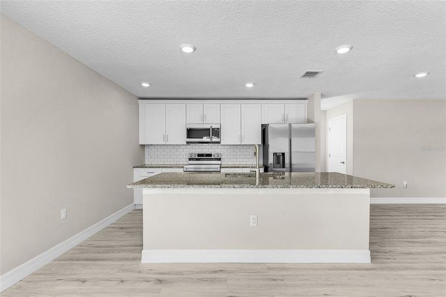 Furnished interior view inside a new home in , North Port (Image 8).