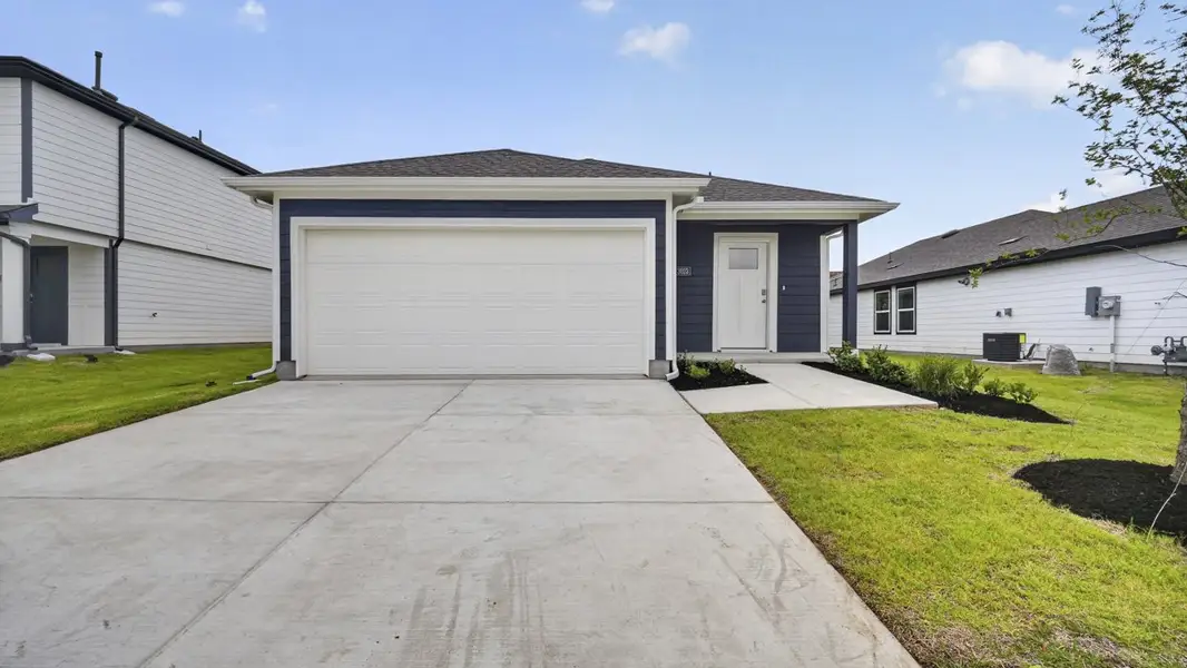 Front exterior of a new home in The Hills of Sherman, Sherman, TX, highlighting curb appeal (Image 1). Front exterior of a new home in The Hills of Sherman, Sherman, TX, highlighting curb appeal (Image 1).