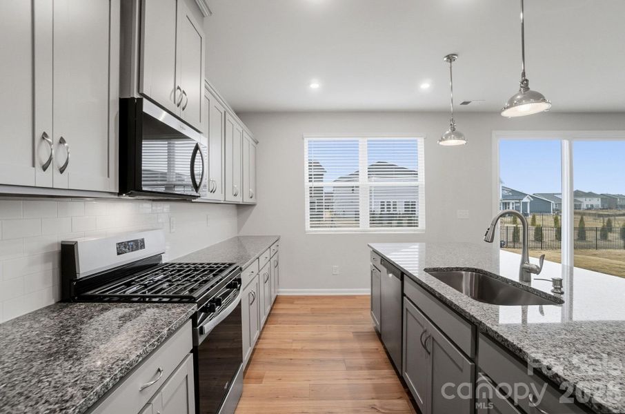 Furnished interior view inside a new home in Waxhaw Landing, Monroe (Image 9).