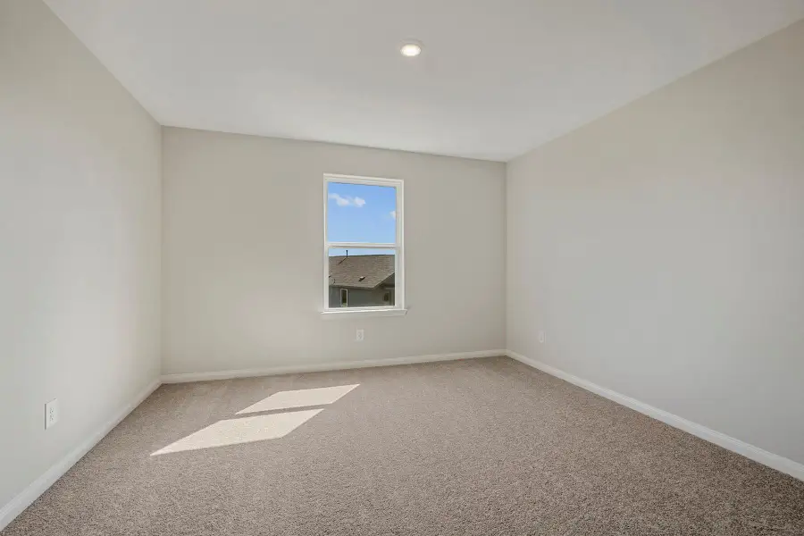 Spacious, unfurnished interior of a new home in Trails at Cochran Ranch, Waller (Image 10).