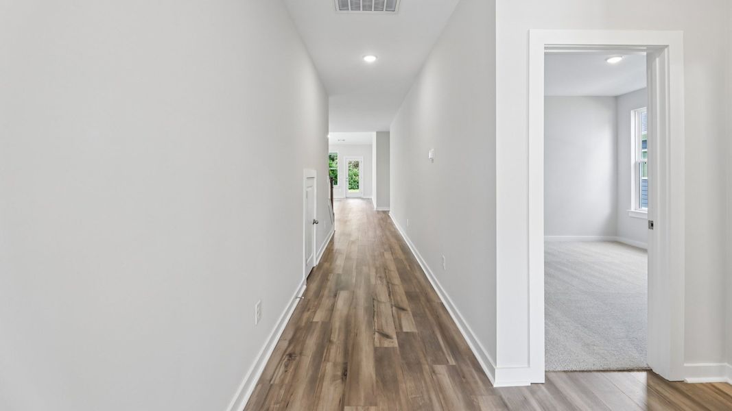 Hallway with access to bedroom