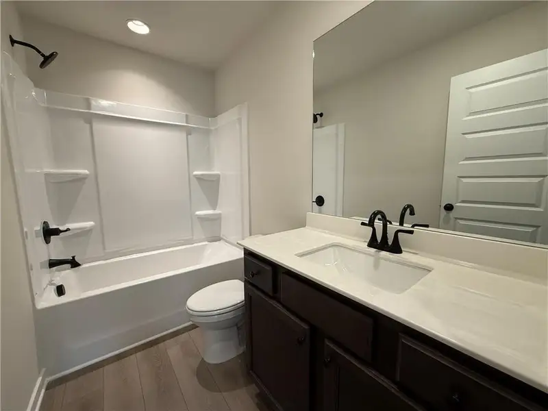 Furnished interior view inside a new home in The Towns at Auburn Station East, Auburn (Image 10).