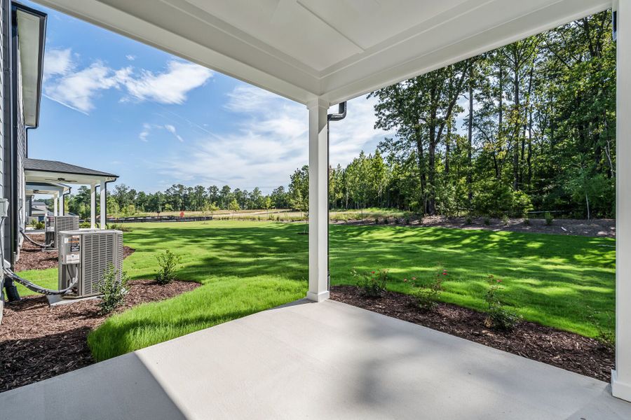 Exterior details and patio area of a home in Serenity - The Village Collection, Fuquay Varina (Image 3). Exterior details and patio area of a home in Serenity - The Village Collection, Fuquay Varina (Image 3).