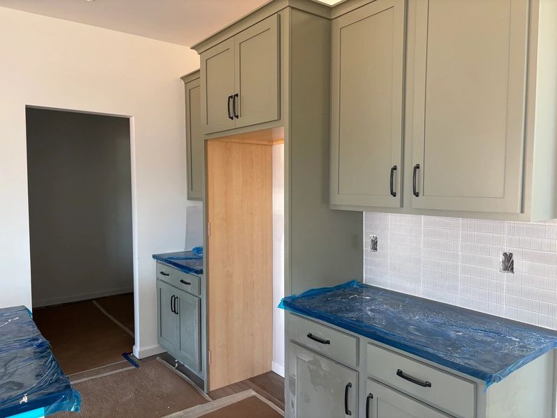 Kitchen featuring the AW Collection® Rosemary - Matte black, light wood, and garden-inspired style. Kitchen featuring the AW Collection® Rosemary - Matte black, light wood, and garden-inspired style.