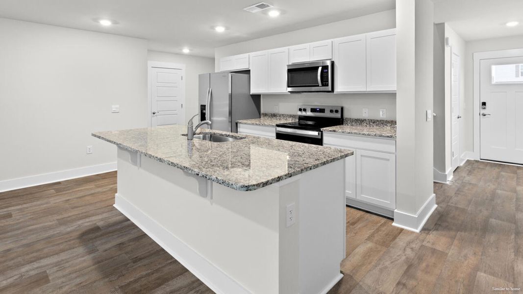 Furnished interior view inside a new home in Vineyard Trail, Jacksonville (Image 6).