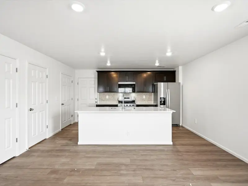 Furnished interior view inside a new home in Skyview at High Point, Aurora (Image 5).