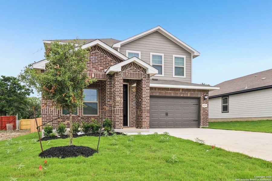 Front exterior of a new home in Royal Crest, San Antonio, TX, highlighting curb appeal (Image 24). Front exterior of a new home in Royal Crest, San Antonio, TX, highlighting curb appeal (Image 24).