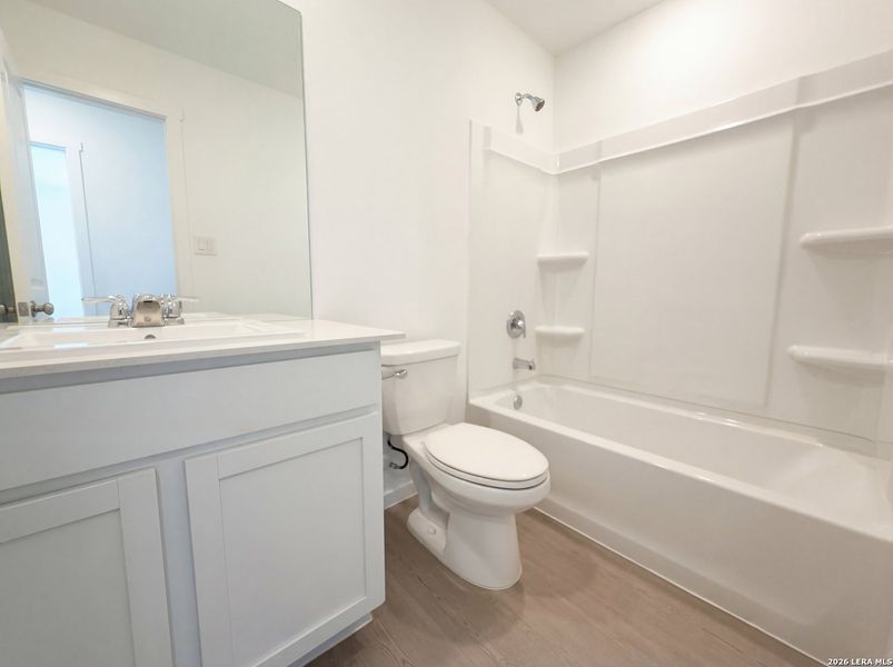 Furnished interior view inside a new home in Hunters Ranch, San Antonio (Image 9).