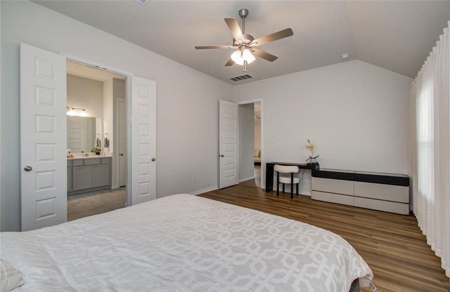 Furnished interior view inside a new home in Sunterra, Katy (Image 22).