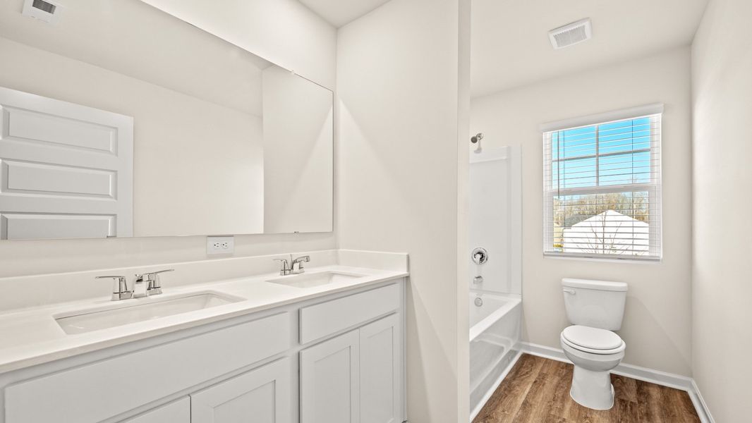 Representative furnished interior of a home built from the Flora by D.R. Horton in Poplar Preserve, Newnan (Image 7).