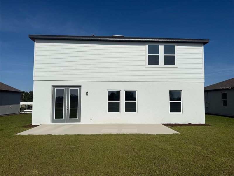 Exterior details and patio area of a home in Tyson Reserve, St. Cloud (Image 3).