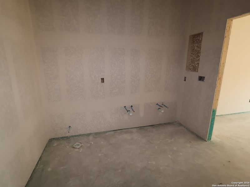 In-progress construction of a new home in Greenspoint Heights, Seguin, TX (Image 32).