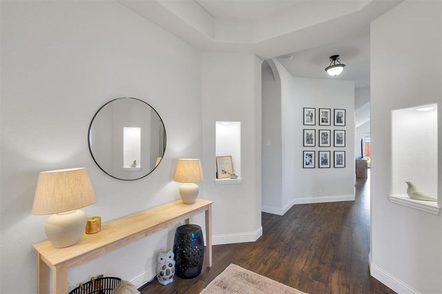 Hall featuring dark hardwood / wood-style floors