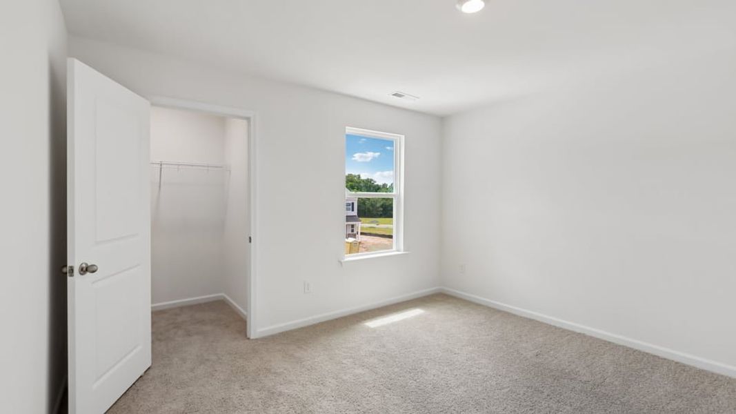 Representative unfurnished interior of a home built from the Manning by D.R. Horton in Laurel Oaks, Sanford (Image 25). Representative unfurnished interior of a home built from the Manning by D.R. Horton in Laurel Oaks, Sanford (Image 25).