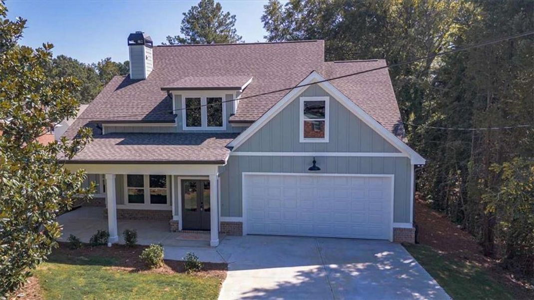 Front exterior of a new home in , Covington, GA, highlighting curb appeal (Image 2). Front exterior of a new home in , Covington, GA, highlighting curb appeal (Image 2).