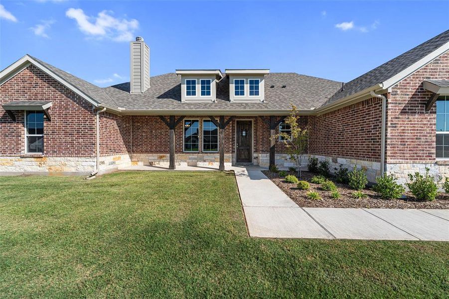 Exterior details and patio area of a home in Nash Estates, Tom Bean (Image 27).