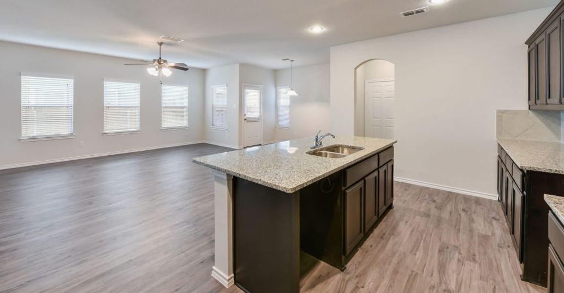 Representative exterior photo of a completed home built from the Adina by Impression Homes in Heartland, Heartland, TX (Image 10). Representative exterior photo of a completed home built from the Adina by Impression Homes in Heartland, Heartland, TX (Image 10).