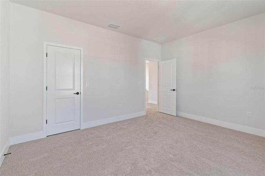 Spacious, unfurnished interior of a new home in Emerald Landing at Waterside at Lakewood Ranch – Cottage Series, Sarasota (Image 36).