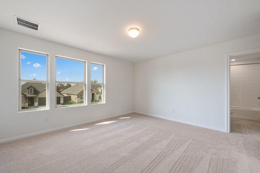 Spacious, unfurnished interior of a new home in The Colony, Bastrop (Image 22). Spacious, unfurnished interior of a new home in The Colony, Bastrop (Image 22).