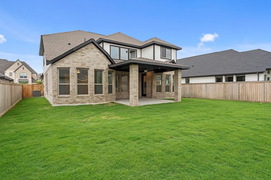 Exterior details and patio area of a home in Bridgeland, Cypress (Image 23). Exterior details and patio area of a home in Bridgeland, Cypress (Image 23).