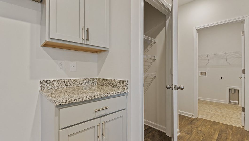 Representative furnished interior of a home built from the Macon by D.R. Horton in Lakestone, Woodruff (Image 8).