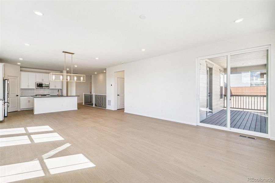 Spacious, unfurnished interior of a new home in Terrain Oak Valley, Castle Rock (Image 19).