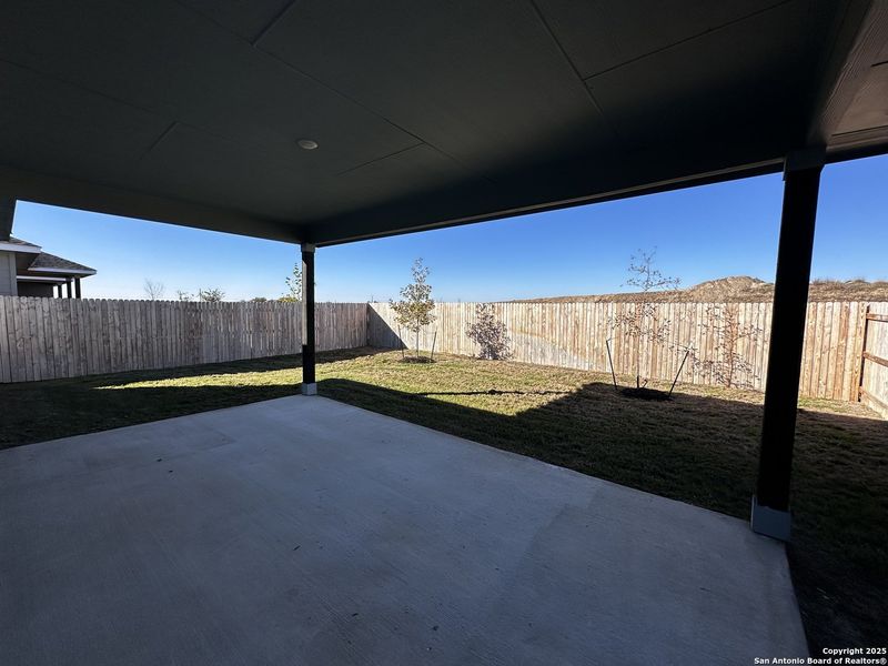 Exterior details and patio area of a home in Hennersby Hollow, San Antonio (Image 2).