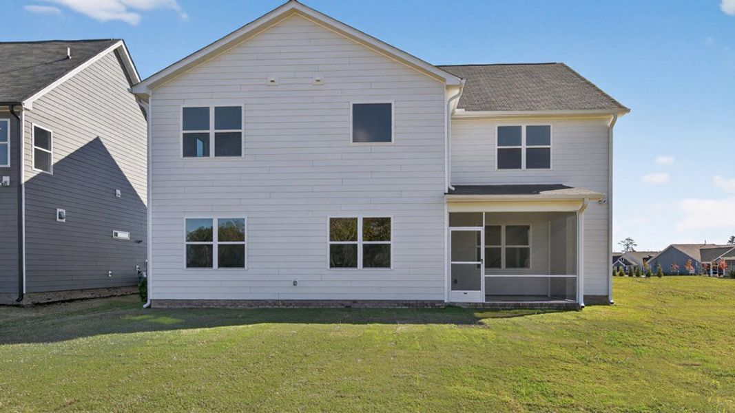 Exterior details and patio area of a home in The Manors at Haywood Glen, Knightdale (Image 4).
