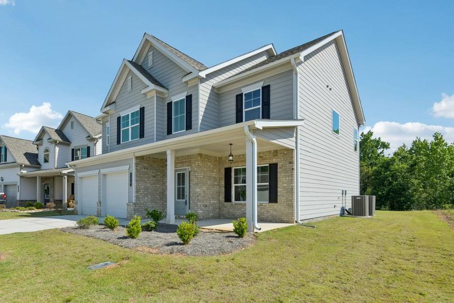 Front exterior of a new home in , Homer, GA, highlighting curb appeal (Image 25).