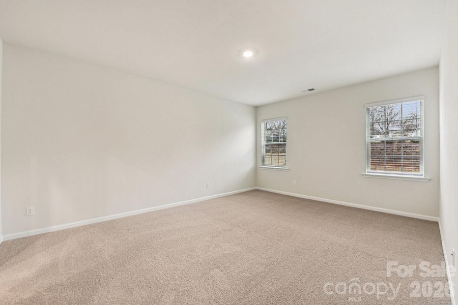 Spacious, unfurnished interior of a new home in Wallace Springs, Statesville (Image 25).