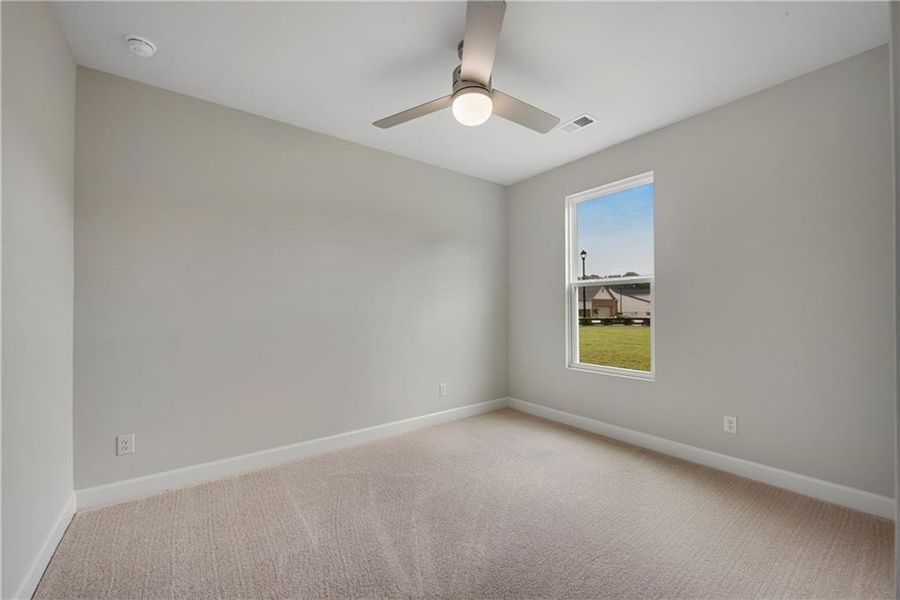 Spacious, unfurnished interior of a new home in Lakecrest, Buford (Image 30).