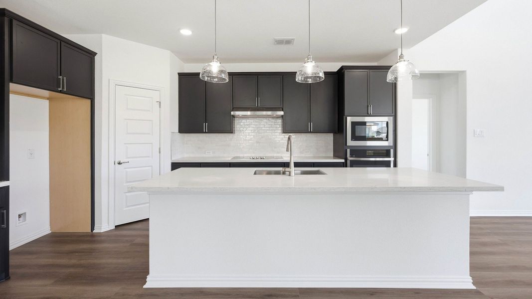 Furnished interior view inside a new home in Oaks at San Gabriel, Georgetown (Image 28).