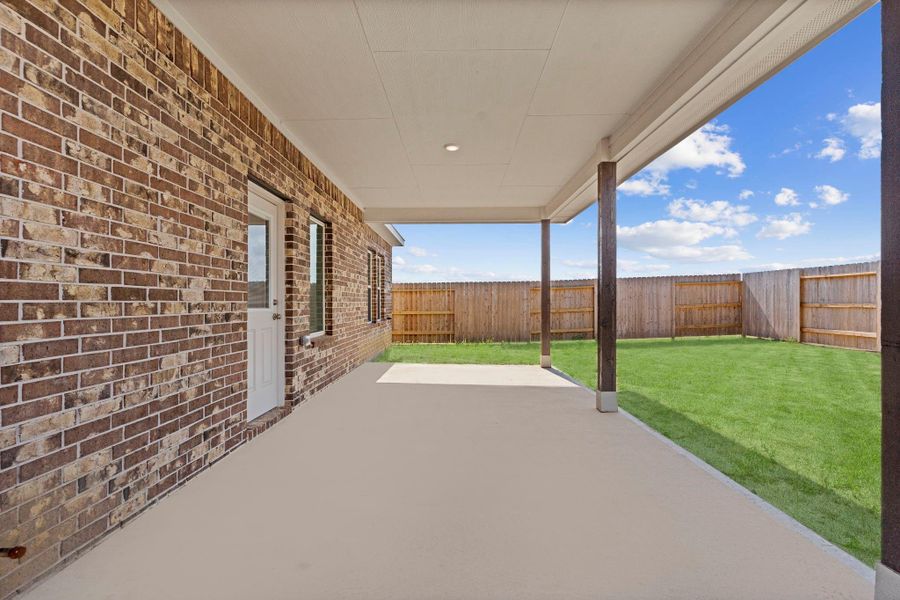 Virtually staged and ready for your outdoor lifestyle! This extended patio offers room for furniture, plants, or even an outdoor dining set. Enjoy year-round comfort and easy indoor-outdoor living. Virtually staged and ready for your outdoor lifestyle! This extended patio offers room for furniture, plants, or even an outdoor dining set. Enjoy year-round comfort and easy indoor-outdoor living.