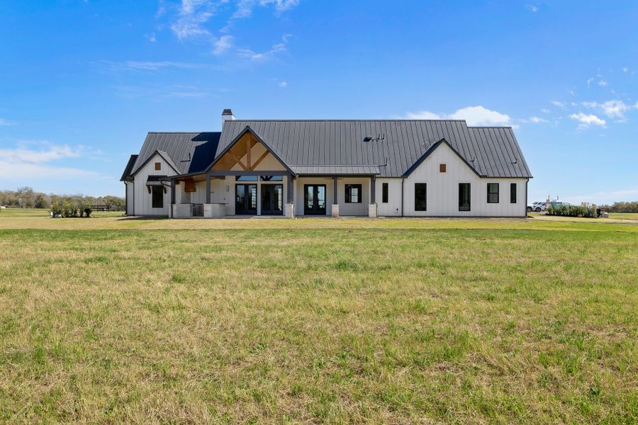 Representative exterior photo of a completed home built from the 3864 by Faircroft Homes in Arborwood, Waller, TX (Image 1).