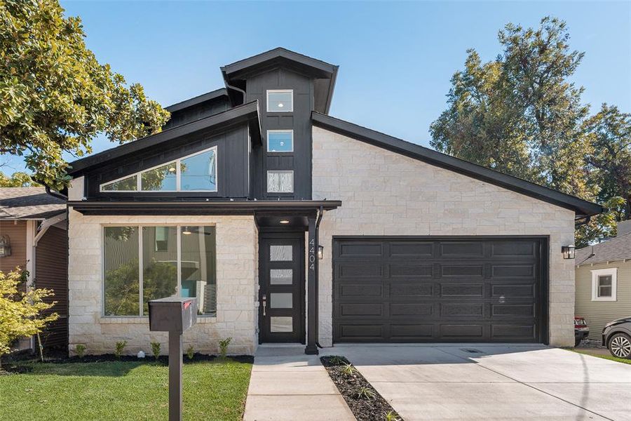 Front exterior of a new home in , Dallas, TX, highlighting curb appeal (Image 2).