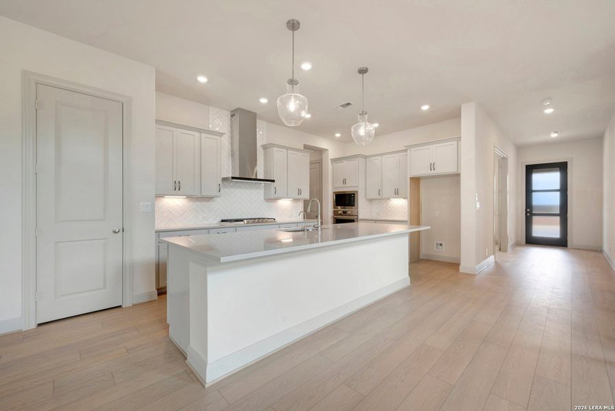 Furnished interior view inside a new home in Windsong - Legacy Series, Boerne (Image 8).