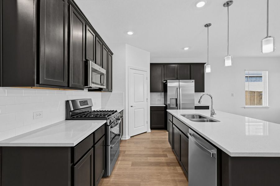 Furnished interior view inside a new home in Parks at Foster Crossing, Anna (Image 8).