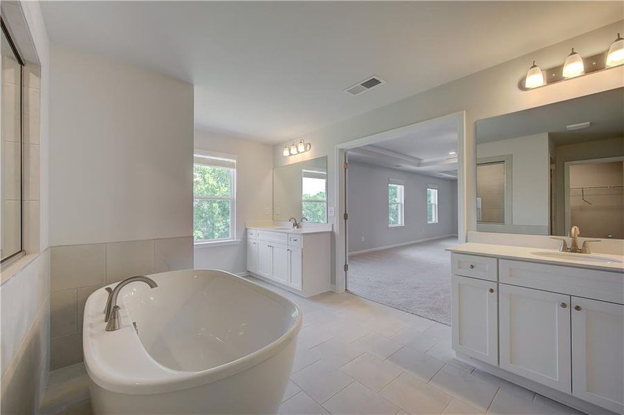 Furnished interior view inside a new home in Westwind Estates, Hampton (Image 7).