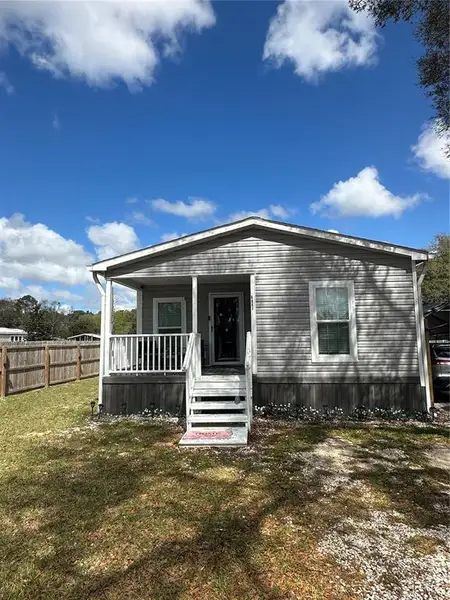Exterior details and patio area of a home in , Ocala (Image 18).