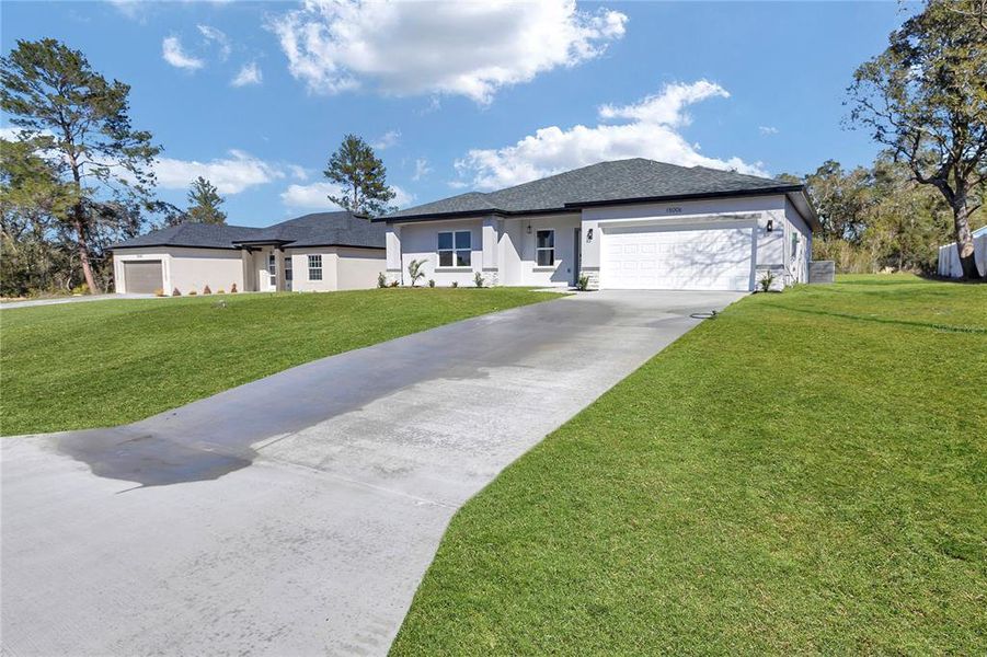 Front exterior of a new home in , Ocala, FL, highlighting curb appeal (Image 24). Front exterior of a new home in , Ocala, FL, highlighting curb appeal (Image 24).