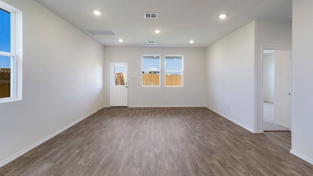 Representative unfurnished interior of a home built from the The Periwinkle by D.R. Horton in Marigold, Kyle (Image 9). Representative unfurnished interior of a home built from the The Periwinkle by D.R. Horton in Marigold, Kyle (Image 9).