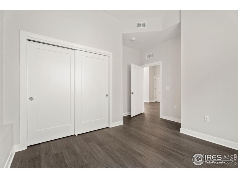 Entrance to main floor bedroom, from main floor living area.