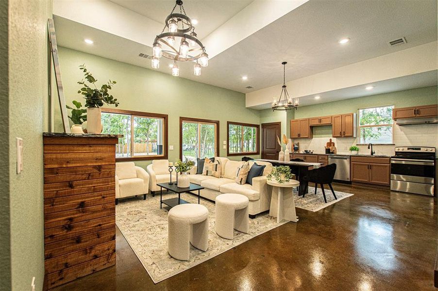 Living room opens to dining and kitchen