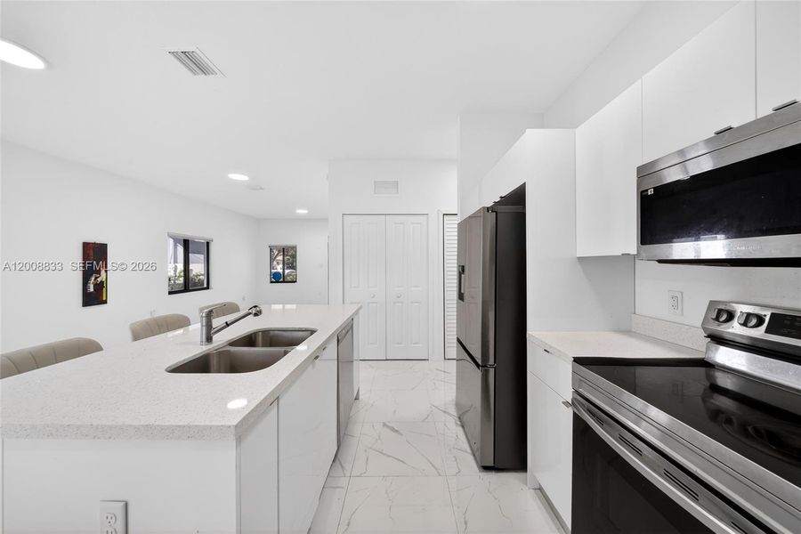 Furnished interior view inside a new home in , Miami (Image 8).