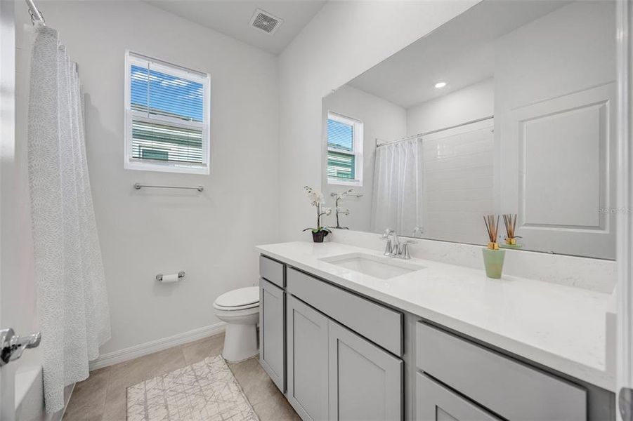 Furnished interior view inside a new home in Woodcreek, Wesley Chapel (Image 17).