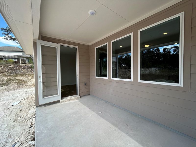 Exterior details and patio area of a home in Provence 50s, Austin (Image 16). Exterior details and patio area of a home in Provence 50s, Austin (Image 16).