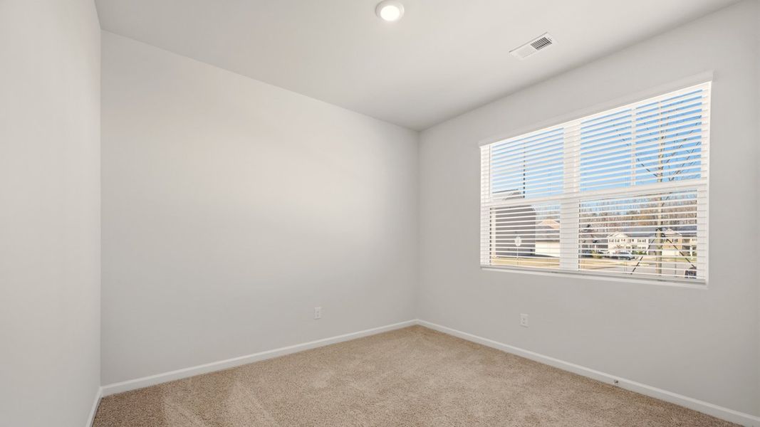 Spacious, unfurnished interior of a new home in The Reserve at Calcutta, Stockbridge (Image 14).