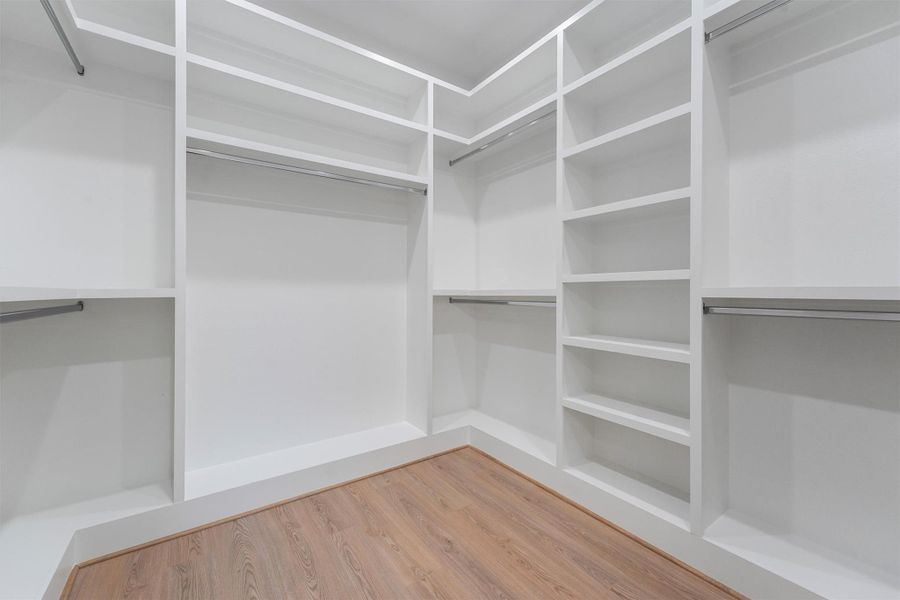 Primary Walk-In Closet Primary Walk-In Closet