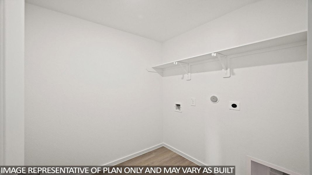 Laundry area with electric dryer hookup, light wood-type flooring, and hookup for a washing machine