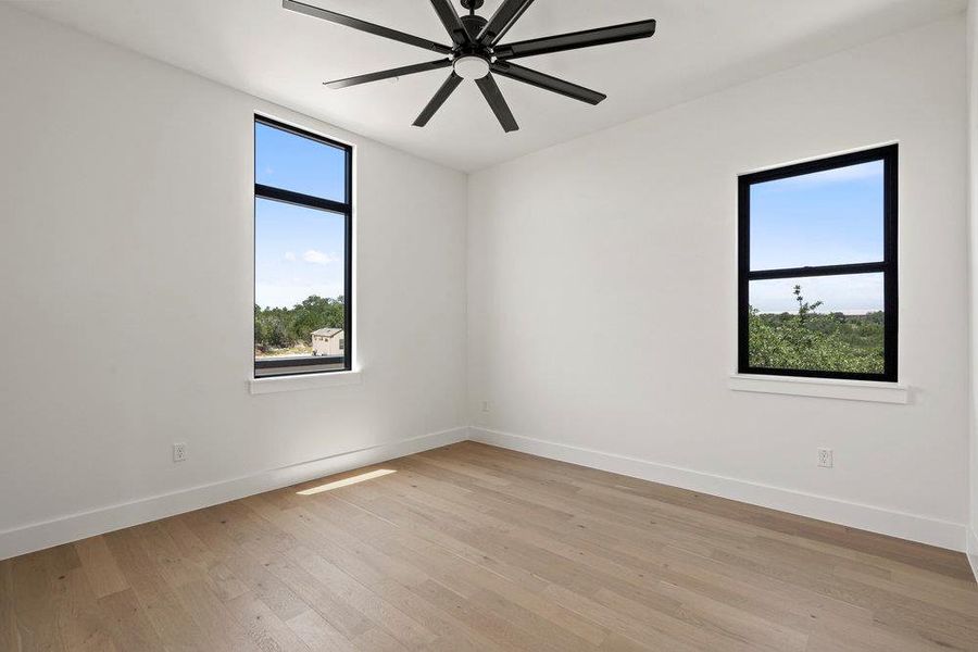 Spacious, unfurnished interior of a new home in Milky Way at River Place, Austin (Image 34).